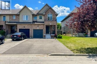 Building Photo - 112 Meadow Wood Crescent