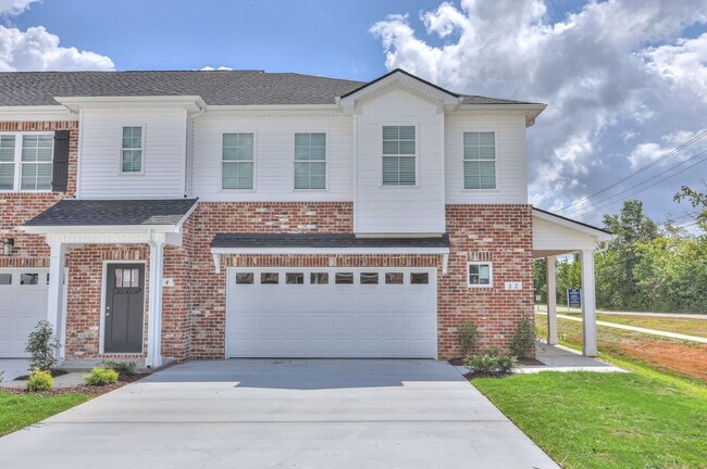 Building Photo - BRAND NEW Luxury 3/2.5 Townhome - MOVE IN ...
