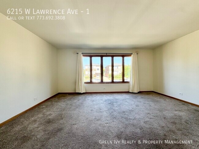 Foto del edificio - 6215 W Lawrence Ave