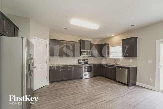 Building Photo - 9030 Evans Woods Dr