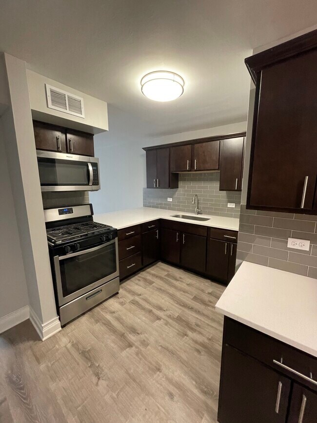 Building Photo - Urban Living with the lake as your front y...