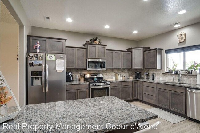 Building Photo - 4 br, 2.5 bath House - 3371 E Bogie Drive