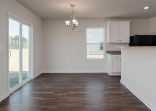 Building Photo - Spacious 3-Bedroom + Loft Home in Meredith Woods – Stylish, Efficient, and Perfect for Entertaining!