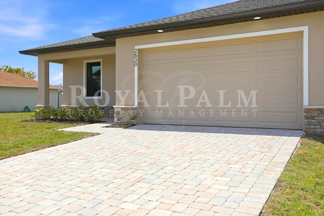 Photo - 3BR/2BA New Construction with Pool, Fence & Garage — Built Yesterday, Ready Today - Cape Coral Apartment