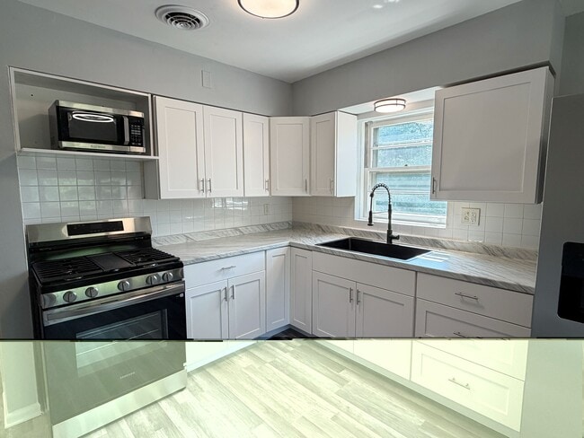 Foto del edificio - 5558 W Wilson Ave