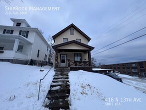 Building Photo - 418 N 13th Ave E