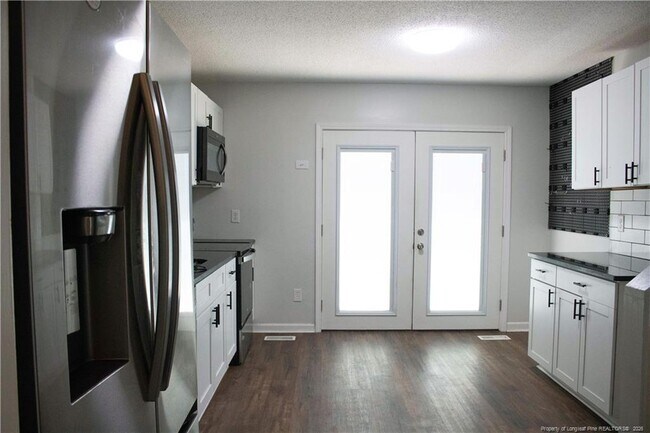Foto del edificio - 5839 Rivercroft Rd