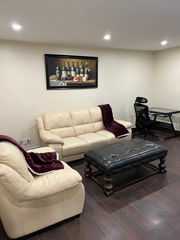 Leather sofa with solid wood ottoman - 3025 The Credit Woodlands