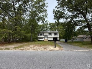 Building Photo - 6 Quail Run Rd