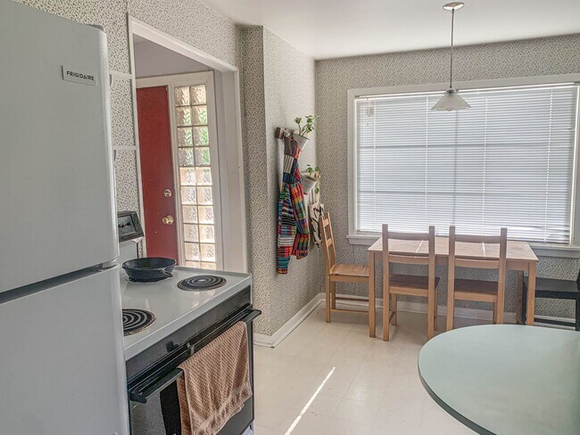 Building Photo - Charming And Spacious Home,  Walk To Green...