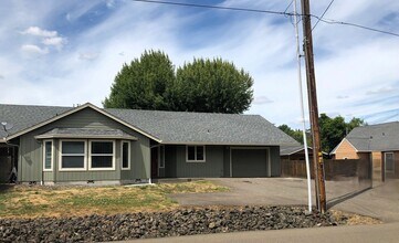 Building Photo - 3084-3094 NE Douglas Ave