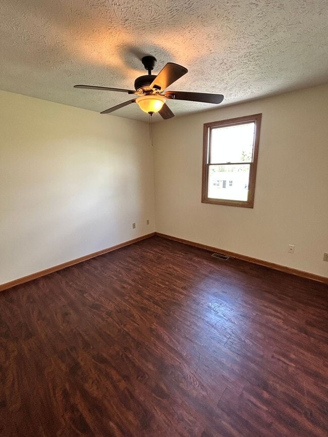 Building Photo - Three Bedroom Duplex
