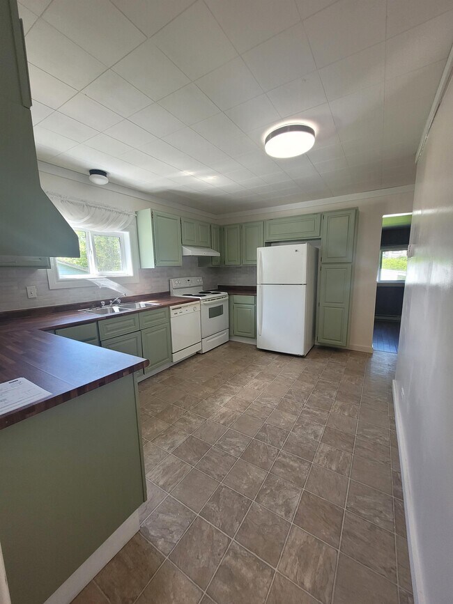 Photo du bâtiment - 415-411 11 Ave E