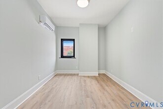Building Photo - 207 E Broadway