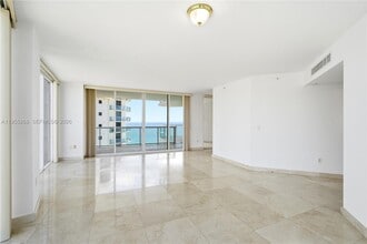 Building Photo - 18671 Collins Ave