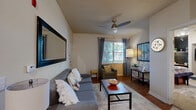 Located at 6730 4th Ave in Sacramento, CA, this 2-bedroom, 2-bathroom residence offers a thoughtfully organized single-level floor plan. The living room features warm hardwood-style flooring, a ceiling fan, and a large window that draws in natural light, creating a welcoming and comfortable gathering space. Adjacent to the living area, a defined dining nook provides an intimate setting for meals, complemented by its own hardwood flooring. The galley-style kitchen is efficiently laid out with warm wood cabinetry, dark countertops, stainless steel appliances including a refrigerator and dishwasher, and matching hardwood-style flooring that ties the shared living spaces together cohesively. Both bedrooms are carpeted and offer a cozy atmosphere with natural light from windows. The primary bedroom includes direct access to its own bathroom, which features a tub/shower combination, a wood-toned vanity with a sink, and hardwood flooring. The second bathroom is similarly appointed with a tub/shower combo and hardwood-style floors. Each bedroom benefits from closet storage, and the overall layout of the home maximizes the efficient use of space throughout.