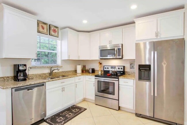 Photo - 19185 Southeast Homewood Avenue, Jupiter, FL 33469 - 4 BR 2 BA single-family home