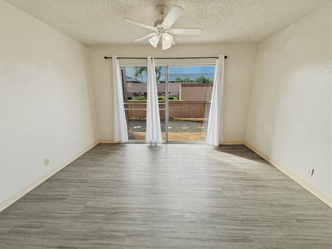 Building Photo - Updated Ground-Floor 1BR Condo in Palm Villas II
