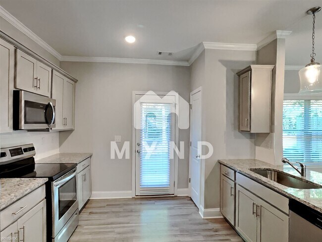 Building Photo - 3 br, 3 bath Townhome - 7730 Fawn Cir