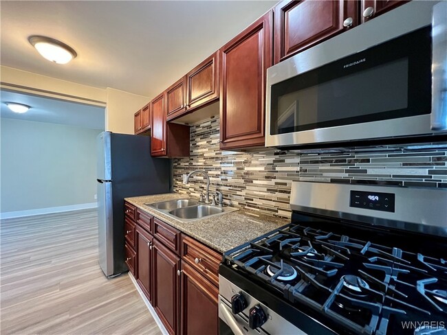 Building Photo - 1225 Hertel Ave