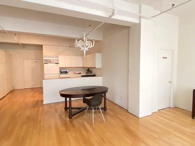 Open chef's kitchen, plenty of storage - 361 W 36th St