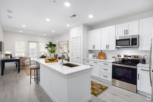 Nest 1BR, 1BA - 914SF - Kitchen - Heron Mill Apartments at Douglasville