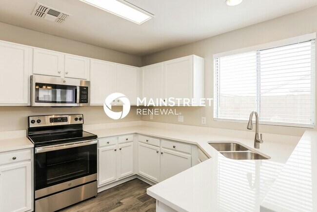 Building Photo - 4 Bedroom Pet-Friendly Home in El Mirage, AZ with Main Street Renewal