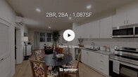 Located at 14147 Darwin Drive in Moreno Valley, CA, this well-appointed 2-bedroom, 2-bathroom single-story home offers a thoughtfully designed layout with modern finishes throughout. Light wood-style flooring flows seamlessly across the entire residence, creating a cohesive and airy feel.

The kitchen is a standout feature, boasting bright white cabinetry extending to the ceiling, a classic subway tile backsplash, grey countertops, and a full suite of stainless steel appliances including a French door refrigerator, range, microwave, and dishwasher. The kitchen opens directly to a dining area and a comfortable living room, making the space ideal for both everyday living and entertaining.

The primary bedroom is generously sized and features a bold navy patterned accent wall, light-filtering windows, and a wall-mounted climate control unit. It is complemented by a spacious walk-in closet with built-in shelving and wire rack systems offering ample storage. The second bedroom also features windows for natural light and access to a well-designed closet.

Both bathrooms are finished in a clean, bright palette. One bathroom includes a full soaking tub with shower, built-in open shelving, and wood-look flooring. The home includes two distinct living areas, providing flexible space for relaxation or a dedicated workspace.