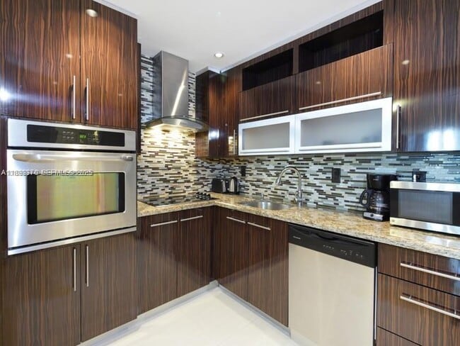 Building Photo - 19390 Collins Ave