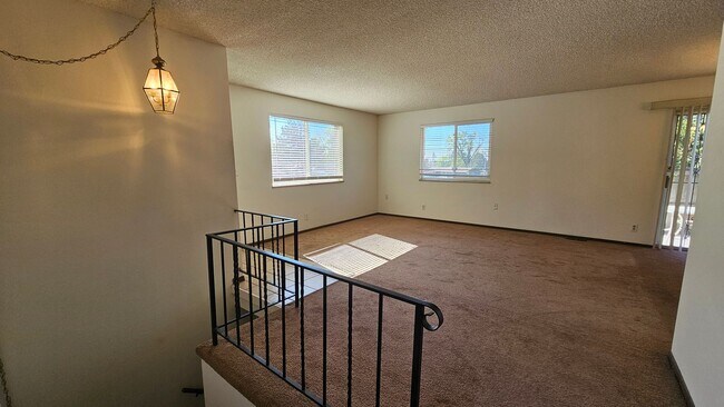 Building Photo - Condo with Garage, Private Patio & Unfinished Basement