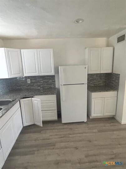 Building Photo - 6904 Wagon Wheel Dr