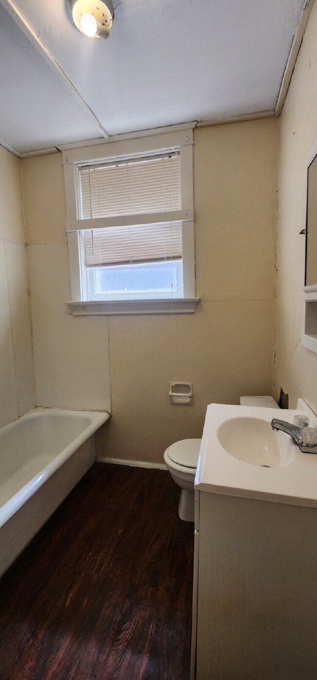 Building Photo - ** MOVE IN SPECIAL** First-Floor Unit with Hardwood Floors & Spacious Living Areas