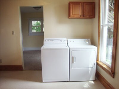 Laundry area in kitchen...refrigerator is to your left. - 512 S Center St