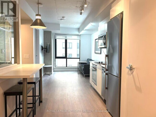 Photo du bâtiment - 105 Champagne Ave S