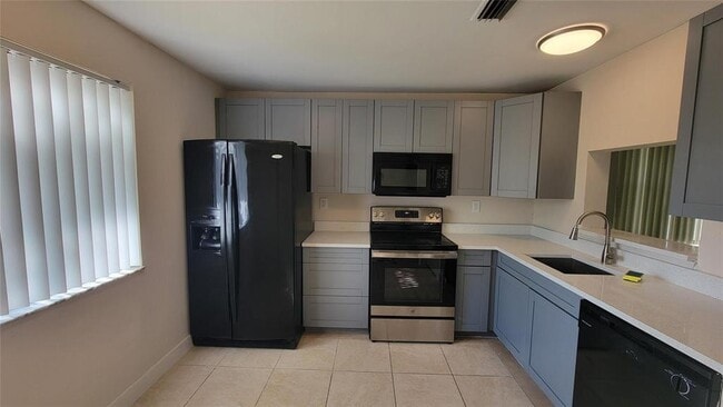 Building Photo - 11443 Royal Palm Blvd