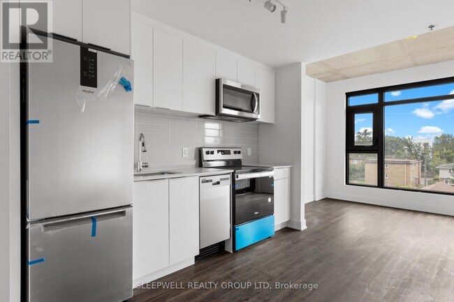 Building Photo - 1360 Carling Ave