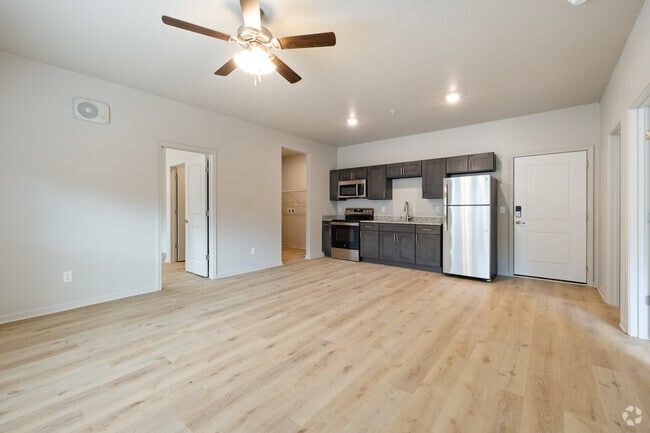 2BR, 2BA - 720SF - Living Room/Kitchen - Platform Flint River