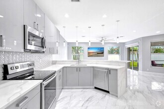 Building Photo - 6453 Paradise Cove