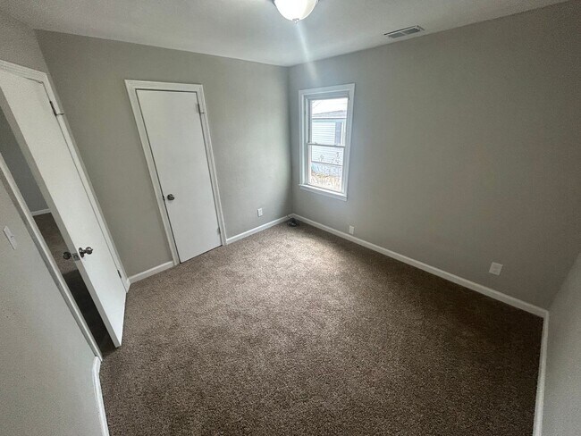 Building Photo - New 4 bedroom, 2 bathroom home for rent in...