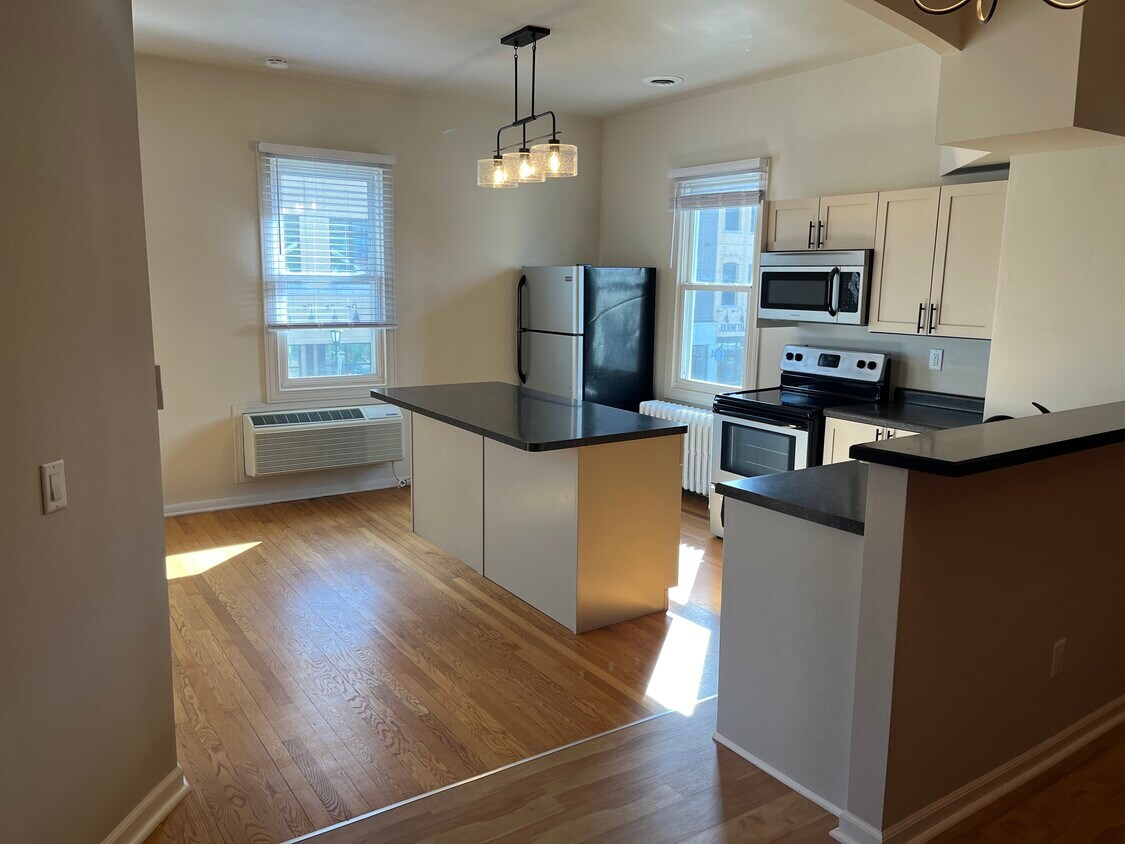 Updated kitchen with new island - 1828 Parmenter St