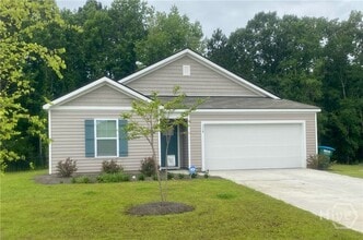 Building Photo - 507 Windsong Dr