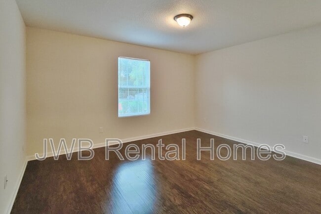 Building Photo - 8423 McGirts Village Ln