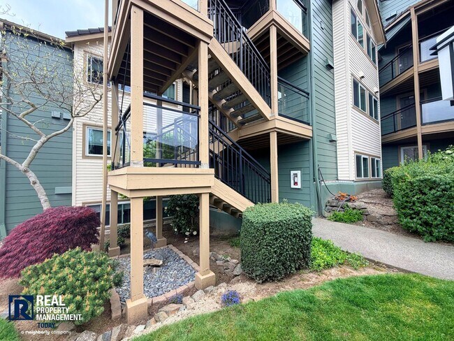 Building Photo - Updated 2 Bed Condo Near the Narrows – Water Views, Covered Parking & Prime Tacoma Location!