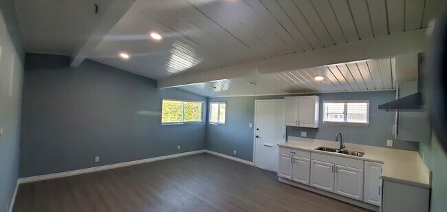 Open floor plan with living room and kitchen - 12003 Marshall St