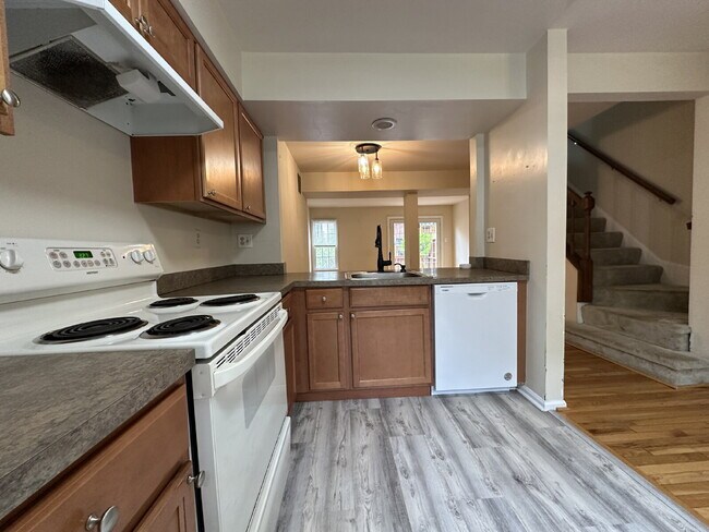 Building Photo - Refined Townhome Living: Avon Model with M...