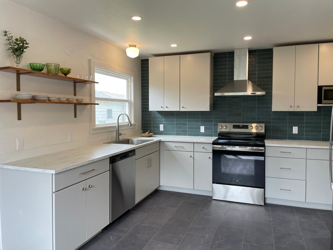 Brand new kitchen and all new appliances and cabinets - 667 Herbert St