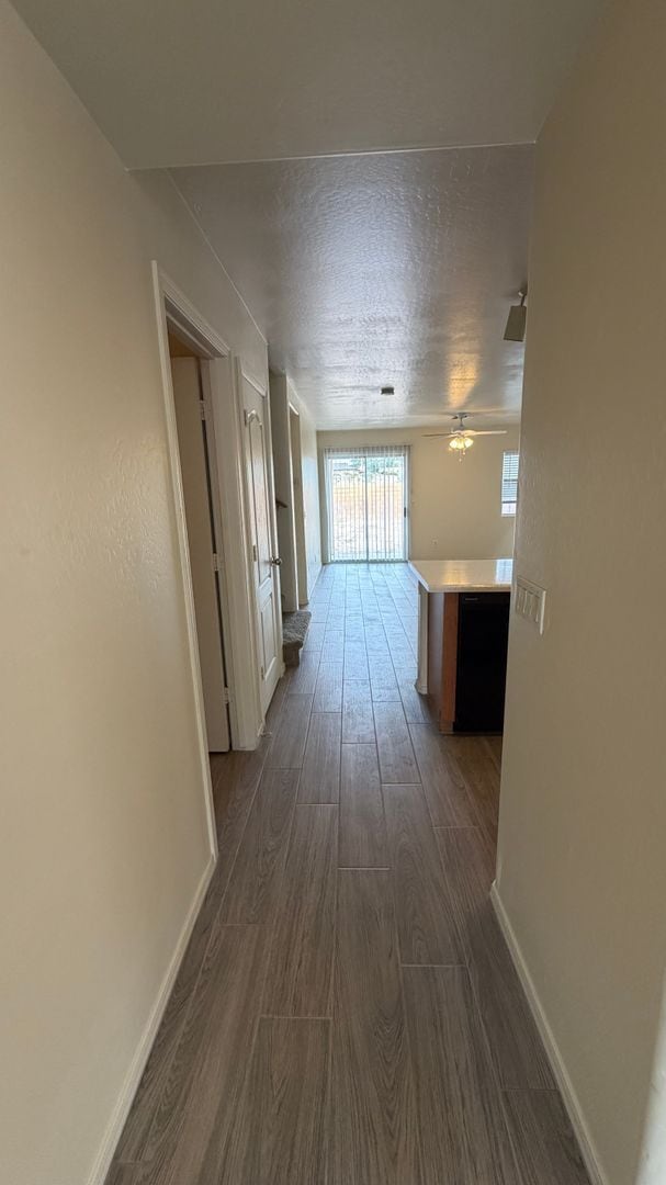 Building Photo - Two Story Home with NEW tile and a large backyard!