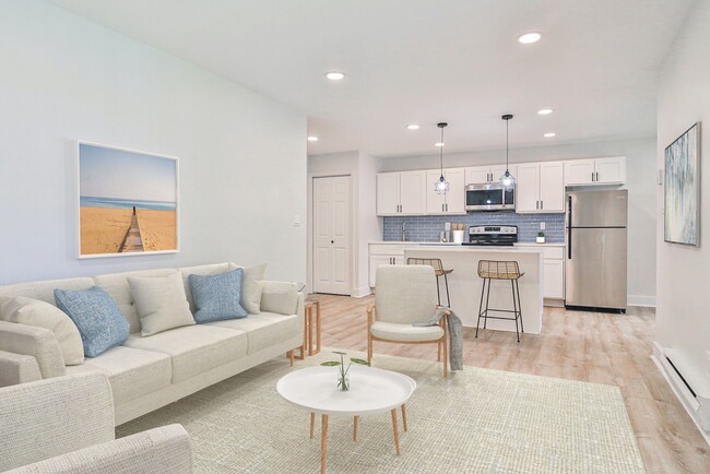 Living Area- Renovated - Jumping Brook Apartments