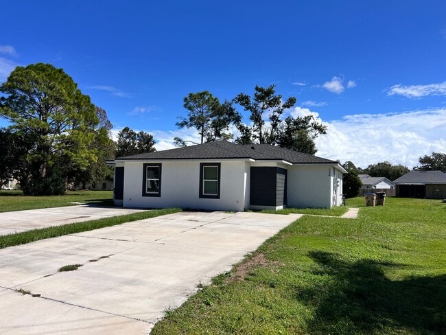 Building Photo - New Designer 3/2 in Kissimmee/Poinciana