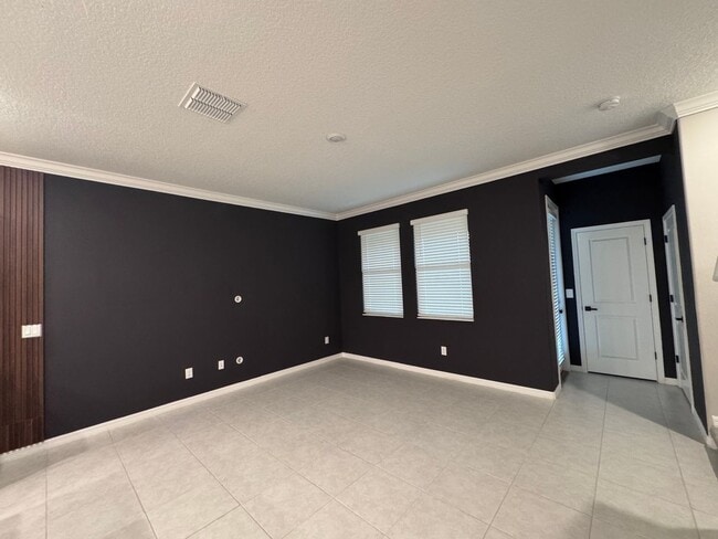 Building Photo - Upgraded Townhome Steps from Wesley Chapel...